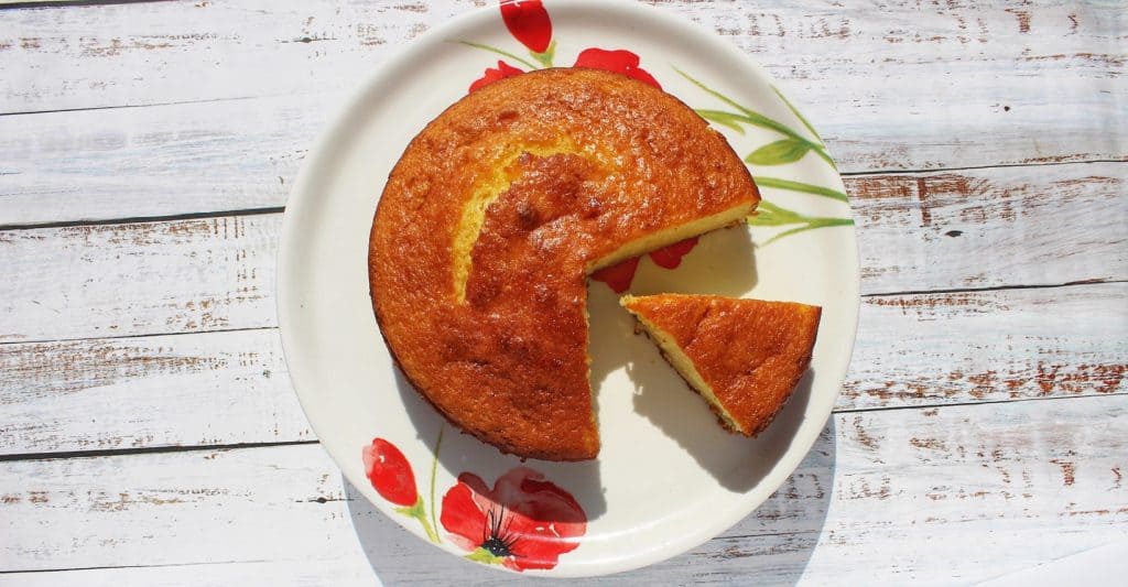 mandarin cake on plate and white background