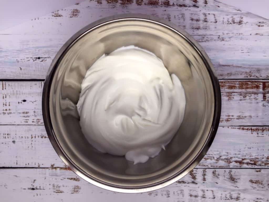 whipped cream in metal bowl