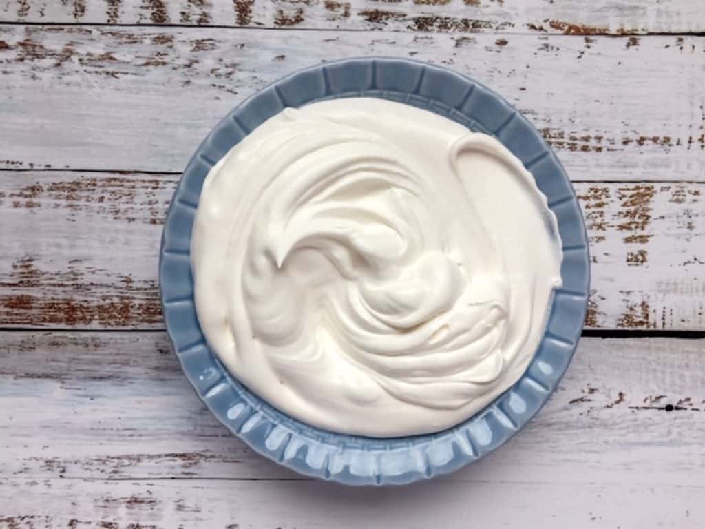 whipped cream in blue bowl