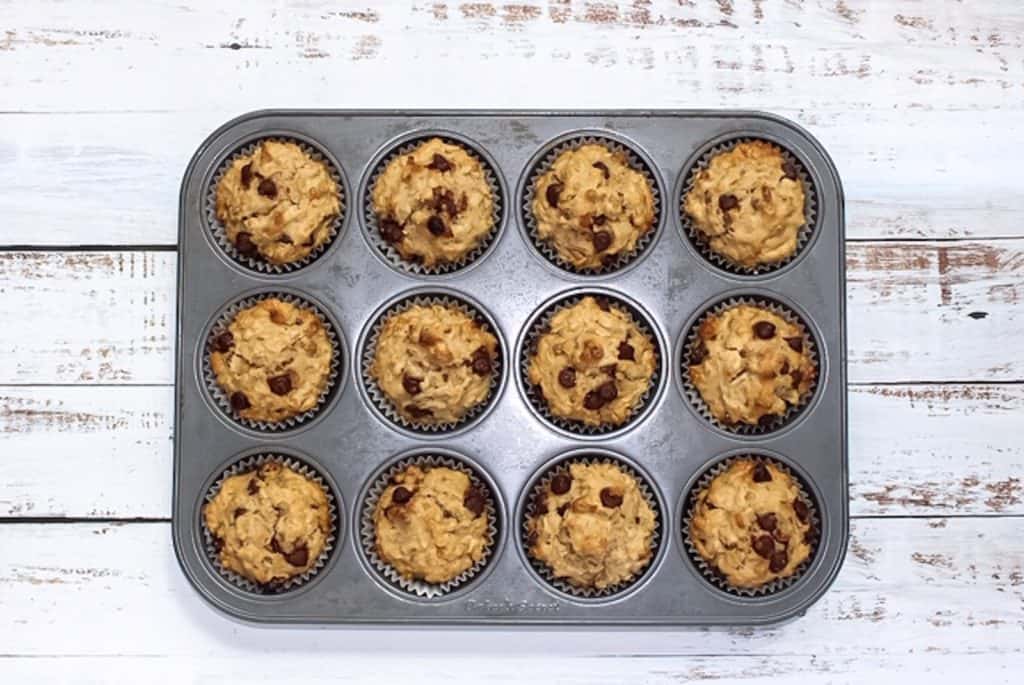 muffins in a muffin tin on white background