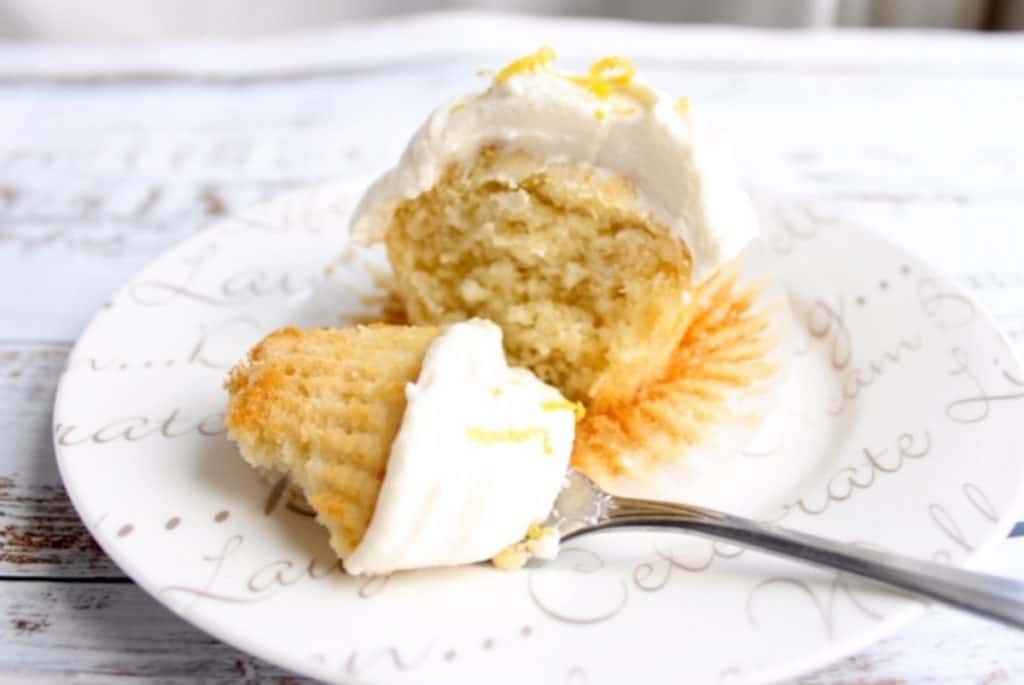 inside of a lemon and honey cupcake on white plate