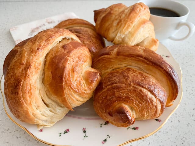 plate of baked croissants