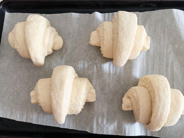 tray of unbaked croissant dough