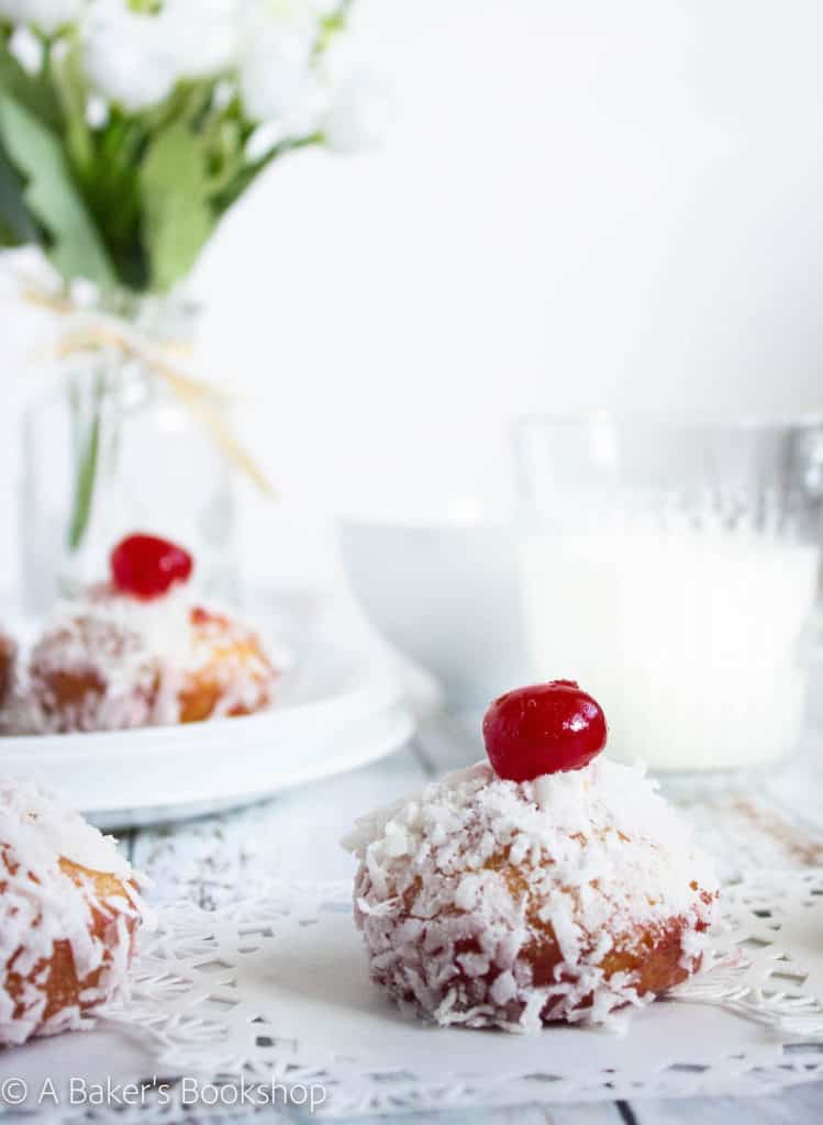 jam and coconut cakes with a glass of milk