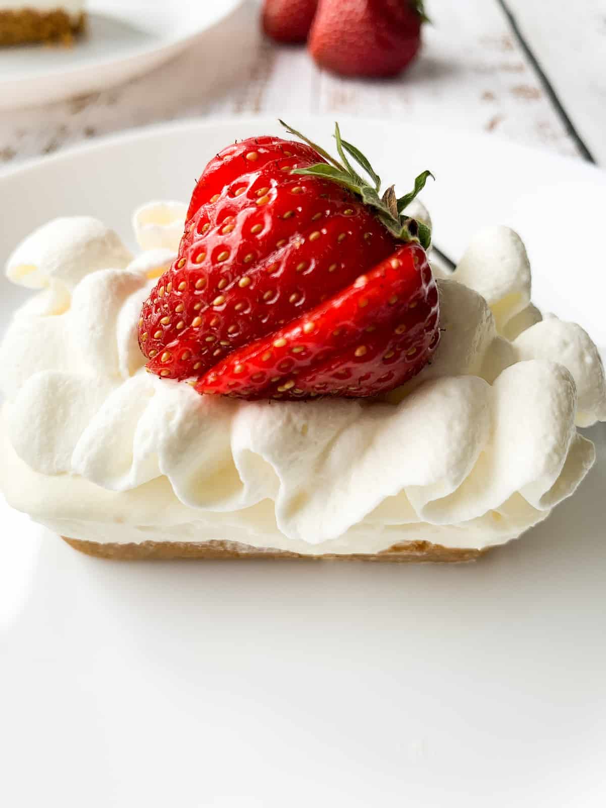 white chocolate cheesecake with strawberry on top