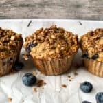three oat muffins in a row