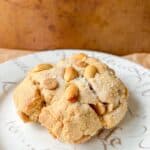 one peanut butter cookie on a white plate