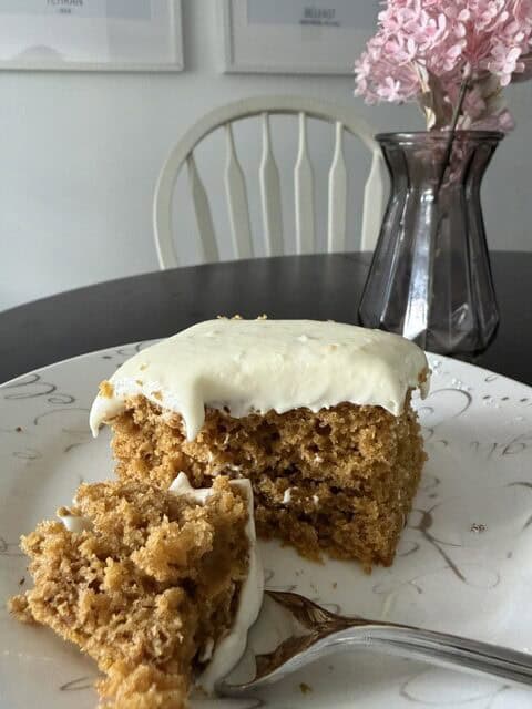 Upclose shot of the pumpkin spice crumb with cream cheese frosting.