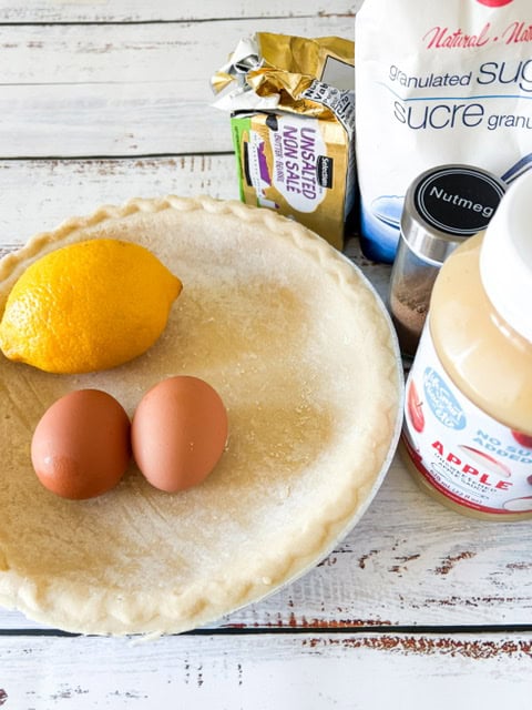 all pie ingredients on a white board background.